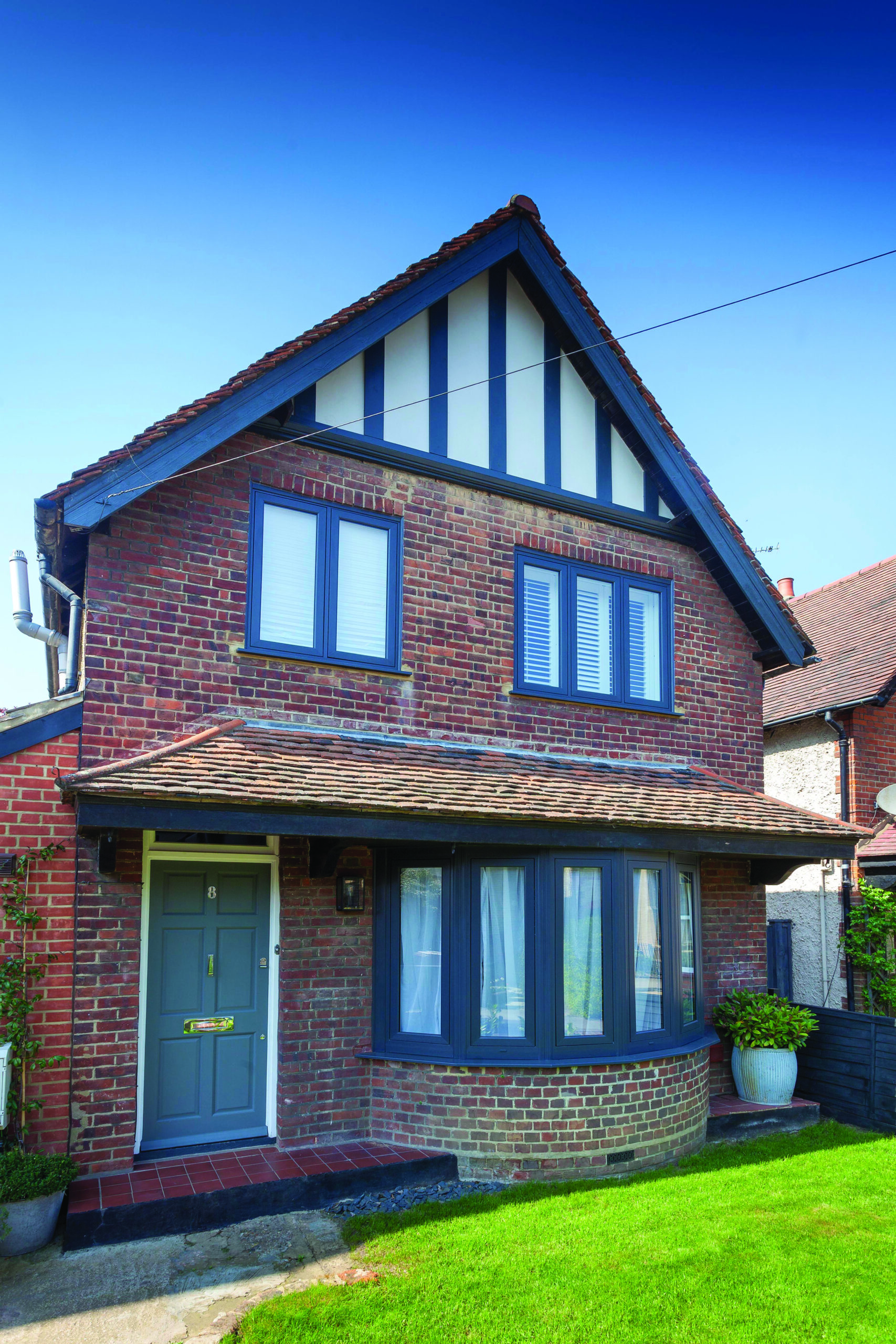 Anthracite Grey flush windows with cladding